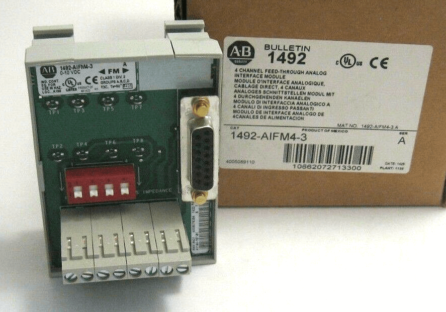 Rockwell 1492-AIFM4-3 wiring module, 4 channel input/output, 3 terminals per channel, with packaging box in the background.